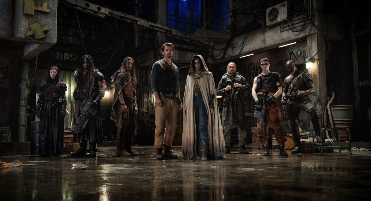 Doona Bae as Nemesis, Ray Fisher as Bloodaxe, Staz Nair as Tarak, Michiel Huisman as Gunnar, Sofia Boutella as Kora, Charlie Hunnam as Kai, E. Duffy as Milius and Djimon Hounsou as Titus in 'Rebel Moon.'