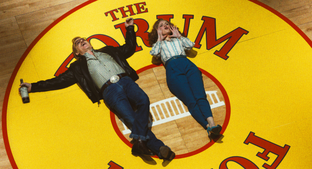 John C. Reilly as Jerry Buss and Hadley Robinson as Jeanie Buss in HBO's 'Winning Time: The Rise of the Lakers Dynasty.'