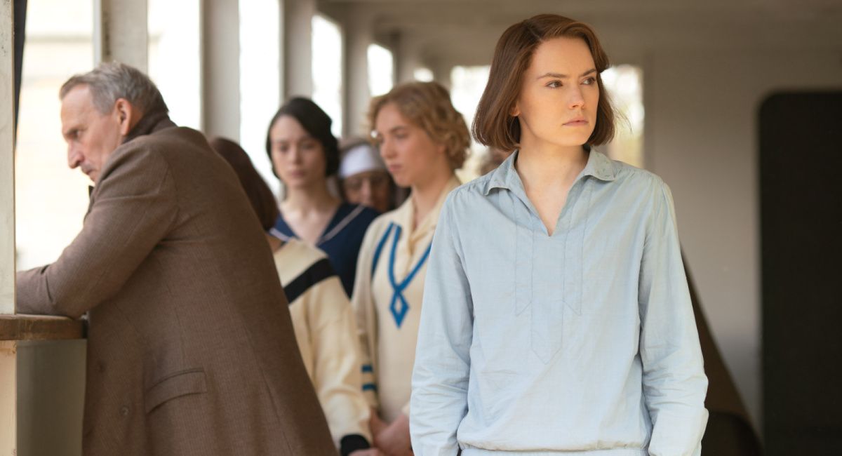 Kim Bodnia as Henry Ederle and Daisy Ridley as Trudy Ederle in Disney's live-action 'Young Woman and the Sea'.