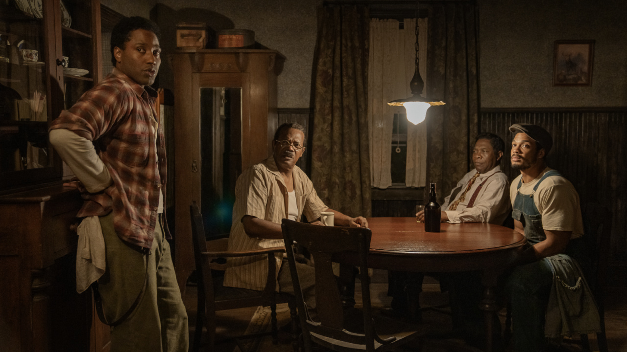 (L to R) John David Washington as Boy Willie, Samuel L. Jackson as Doaker Charles, Michael Potts as Wining Boy and Ray Fisher as Lymon in 'The Piano Lesson'. Photo: David Lee/Netflix © 2024.