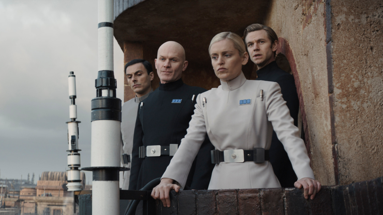 (L to R) Corv (Noof Ousellam), Lieutenant Keysax (Nick Moss), Supervisor Dedra Meero (Denise Gough) and Captain Vanis Tigo (Wilf Scolding) in Lucasfilm's 'Andor', exclusively on Disney+. ©2022 Lucasfilm Ltd. & TM. All Rights Reserved.