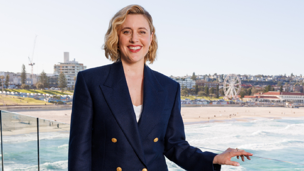 'Barbie' Director/Writer Greta Gerwig attends a Photo Call at Bondi Beach in Sydney, Australia. Photo Credit: Caroline McCredie Photography.