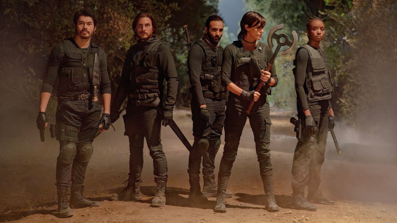(L to R) Henry Golding as Tuah, Luca Marinelli as Nicky, Marwan Kenzari as Joe, Charlize Theron as Andy and KiKi Layne as Nile in 'The Old Guard 2'. Photo: Eli Joshua Ade/Netflix © 2025.